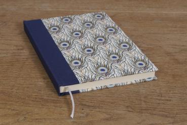 Schreibbuch fester Einband, Pfauenfedermotiv blau und gold, blauer Rücken, Kapitalband